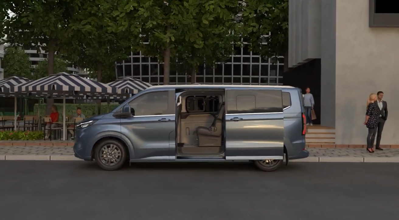 Blue Ford Tourneo Custom minivan with sliding door open, parked on urban street with pedestrians and striped awning in background